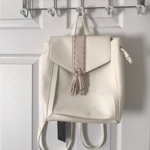 Cream handbag with gold and pink accents